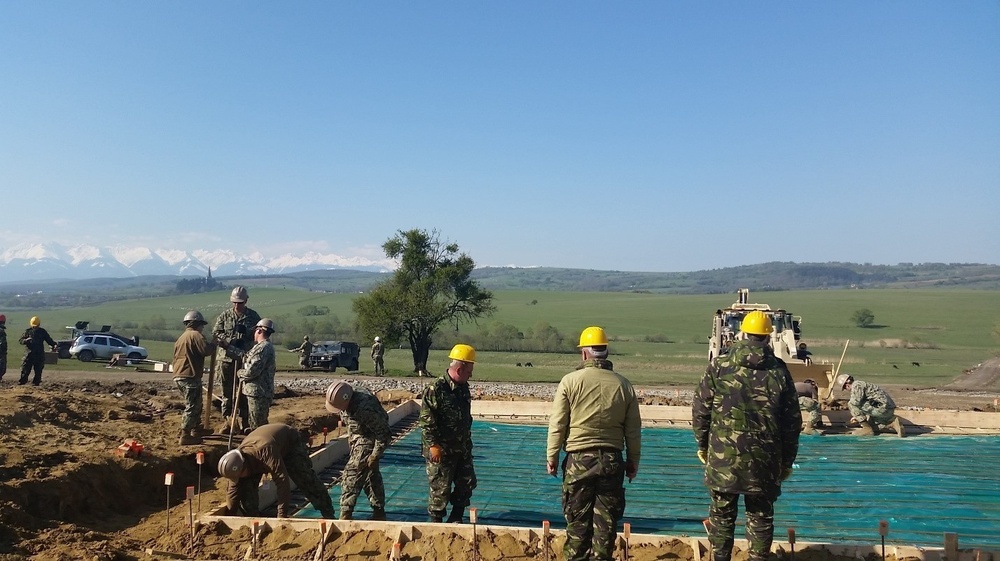 Romanian and U.S. Soldiers Construct Operations and Storage Building