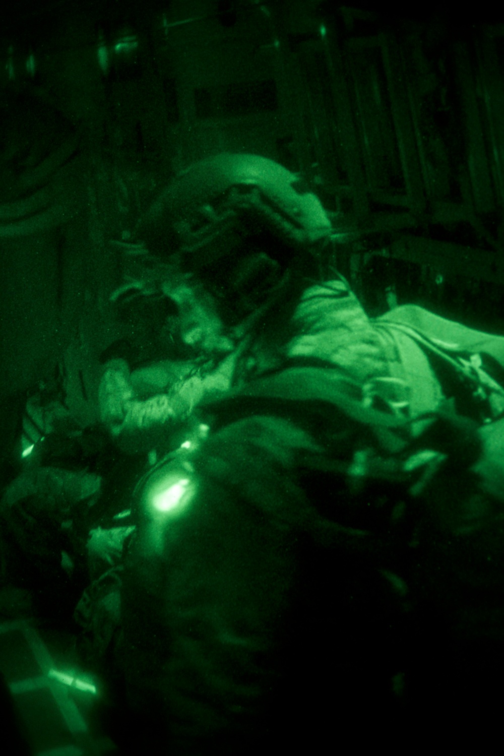 U.S. SOF conduct night airborne operations over the skies of Sweden