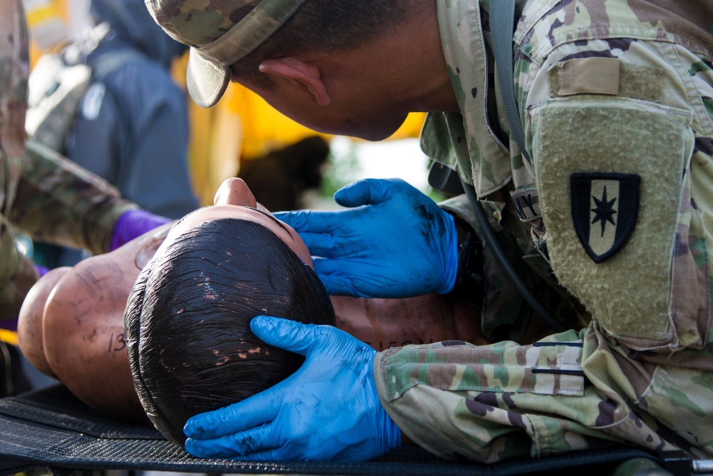 602nd Medic Assesses Scenario Victim