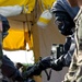 CBRN Soldier Checks Scenario Victim For Contamination