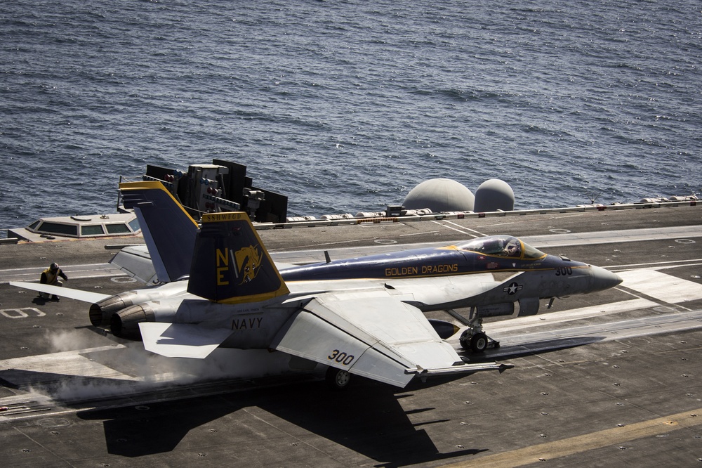 An F/A-18E Super Hornet from the “Golden Dragons” of Strike Fighter Squadron (VFA) 192 takes off from the Nimitz-class aircraft carrier USS Carl Vinson (CVN 70)