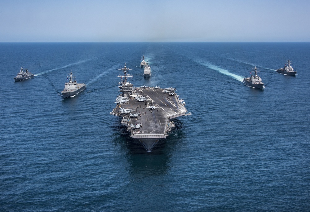 Korean and US destroyers, cruisers, carriers transit the western Pacific Ocean