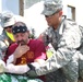Military Police Company help survivors of simulated nuclear catastrope at Guardian Response 17