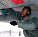 67th AMU Weapons Load Crewmembers put talons on their Eagles