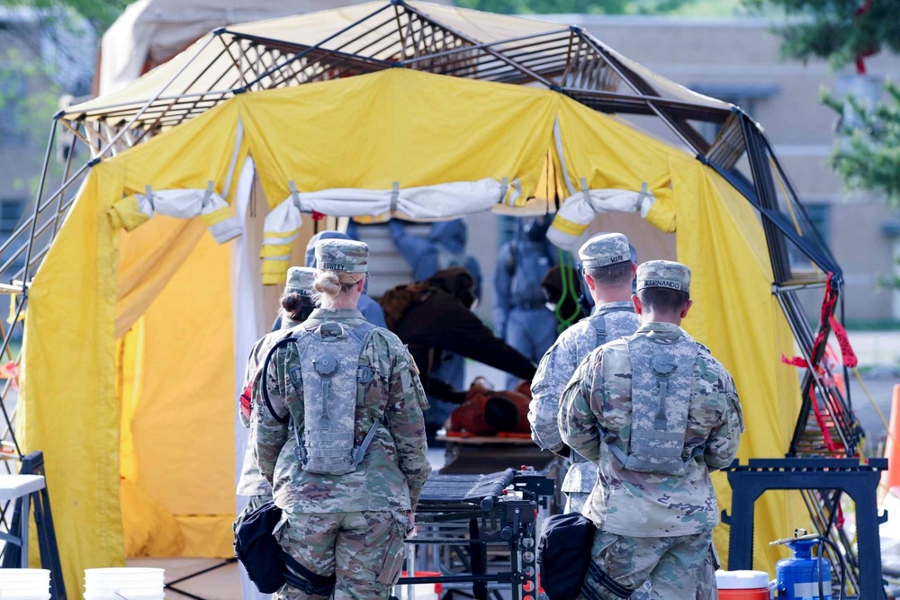 602nd Medics Await Simulated Casualty in Decontamination Process