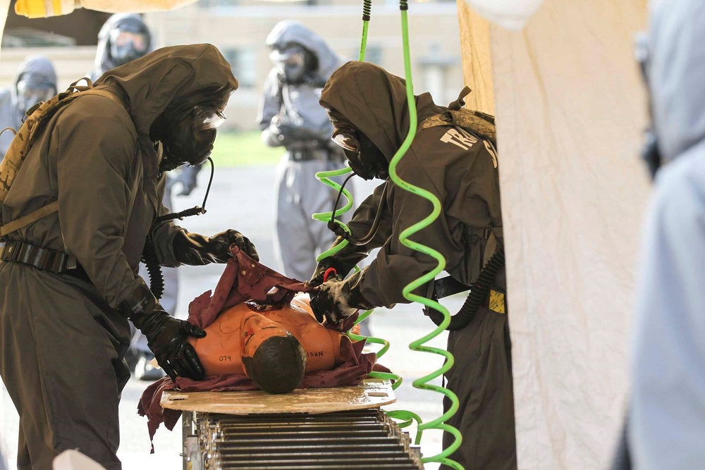 51st CBRN Soldiers Decontaminate a Simulated Casualty During Guardian Response