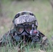 318th Chemical Soldier Defends Against Enemy Forces During Chemical Attack