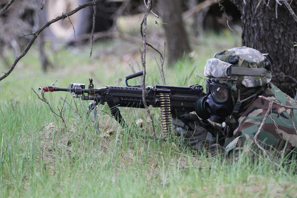 318th CBRN Soldier Defends Against Enemy Attack