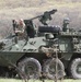 327th CBRN Soldier Dismounts Stryker Vehicle