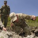 EOD Team Leader Inspects Shot Remains