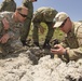 EOD Team Leader Inspects Shot Remains