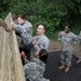 Soldiers of the 213th Personnel Company trains on an obstacle course at the Fort Indiantown Gap