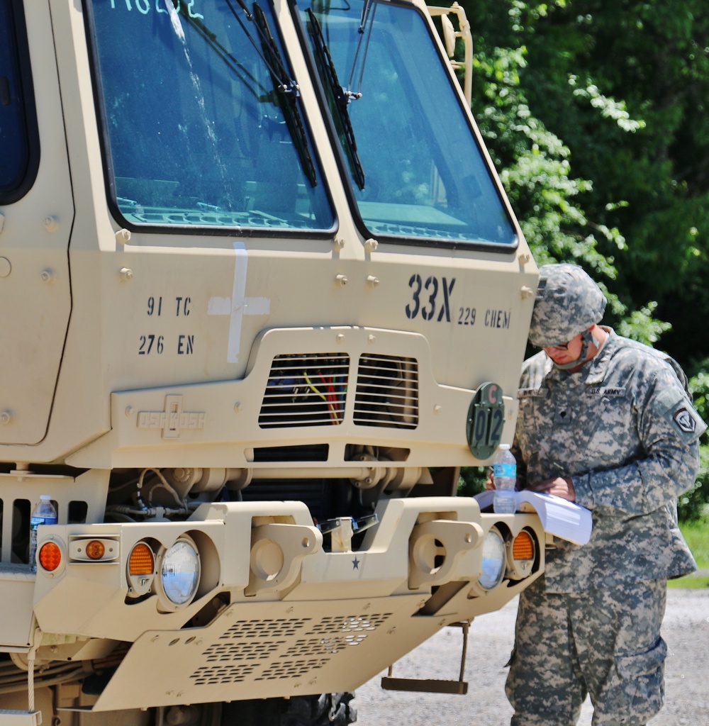 Soldiers conduct vehicle inspections