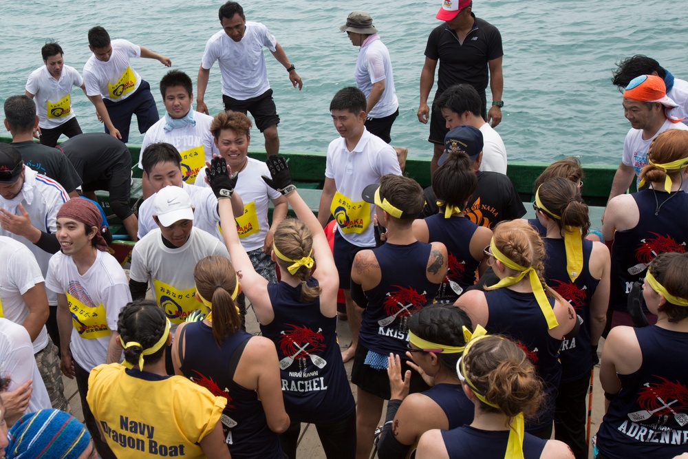 Service members compete in 43rd Naha Harii Festival 2017 Dragon Boat races