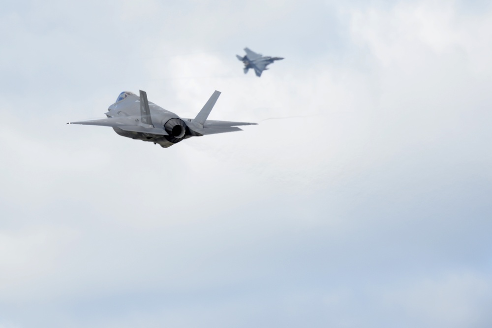 F-35s and F-15s Take-off for training
