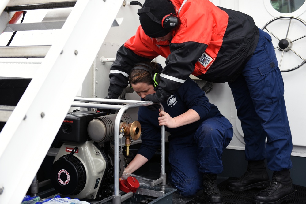Coast Guard Cutter Swordfish crew trains while underway in the Strait of Juan de Fuca