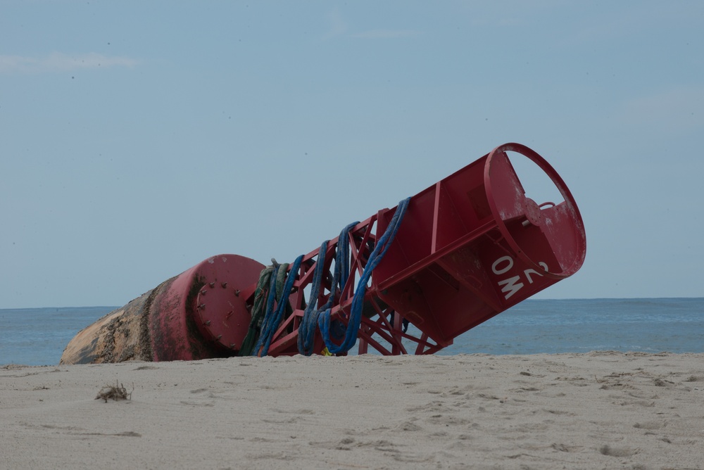 Coast Guard Cutter Oak, Connecticut National Guard team up to airlift beached buoy