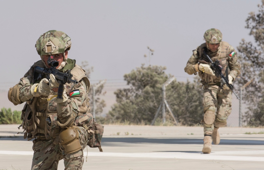 Members of the Jordanian Special Operations secure a landing pad during a fast roping exercise in Amman, Jordan during Eager Lion 2017.