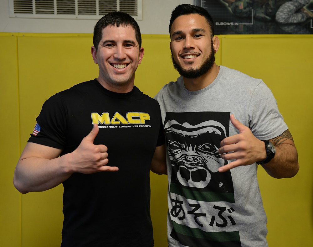 A world away: UFC fighter and Soldier reunite