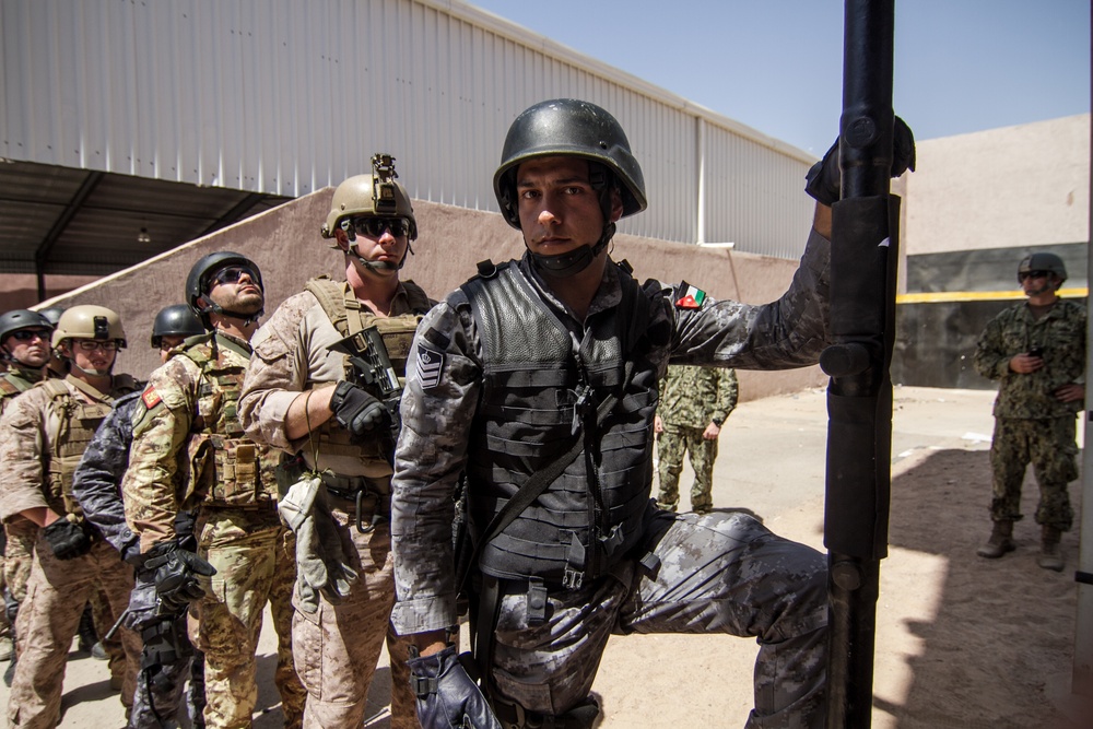 Jordanian Navy member prepares to climb a repel tower during Eager Lion 17