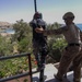 U.S. Marine assists the Jordanian Navy in a fast rope exercise during Eager Lion 2017