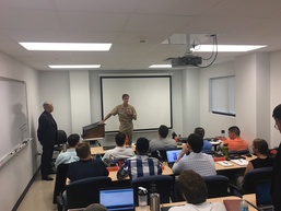 OCEANOGRAPHER OF THE NAVY SPEAKS TO FIRST UNMANNED CERTIFICATION CLASS