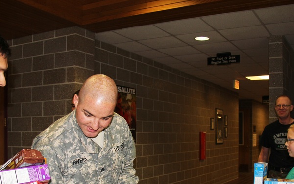 Girl Scouts donate cookies