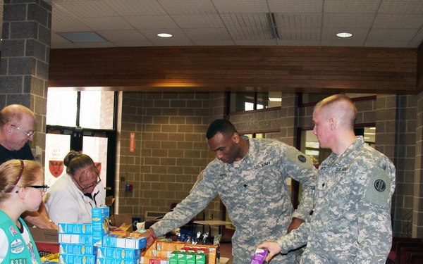 Girl Scouts donate cookies