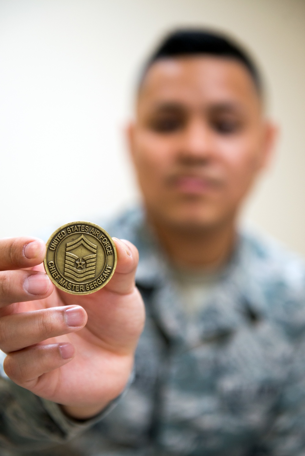 AMC/CCC gives meaningful coin to Airman