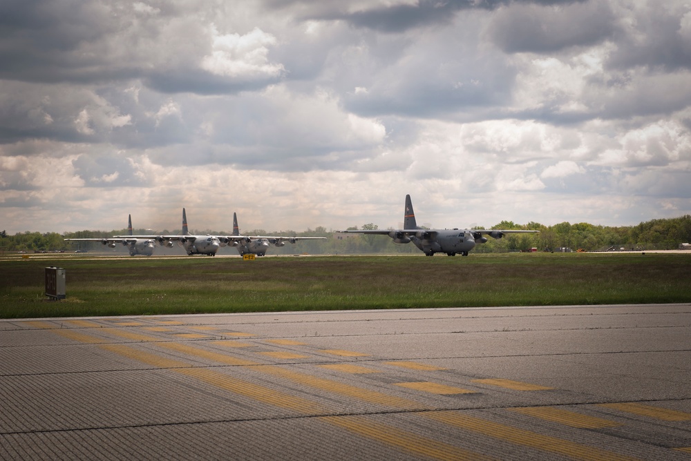 C-130H Hercules aircraft conduct four-ship formation