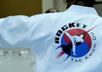 Black belt master champions student success