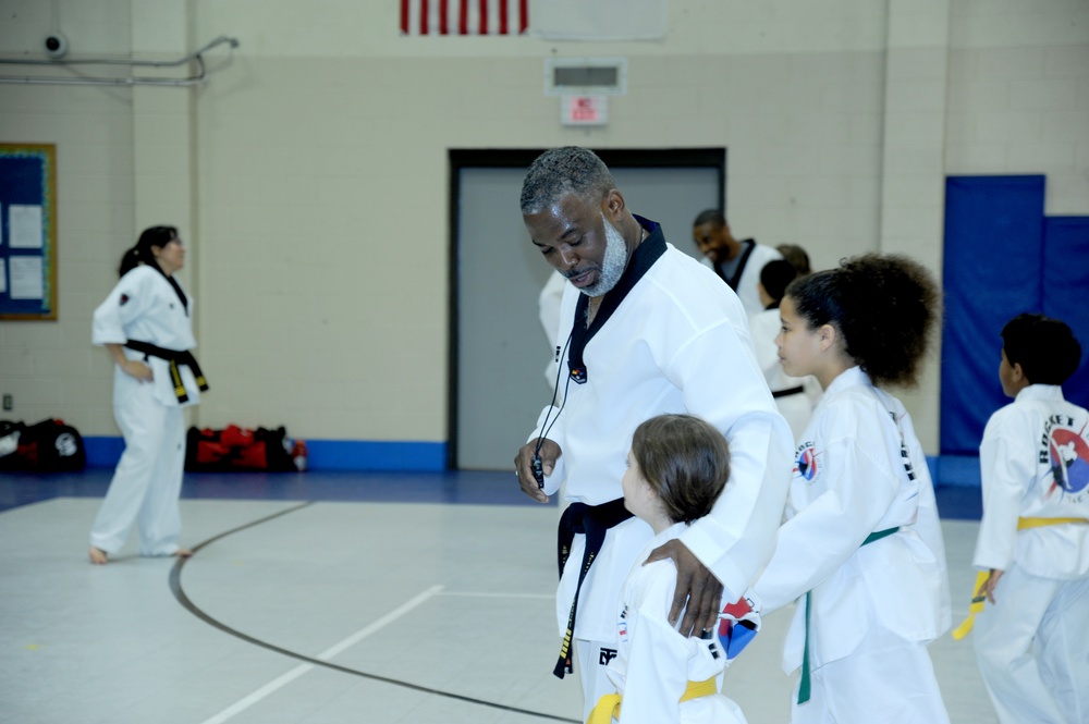 Black belt master champions student success