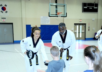 Black belt master champions student success