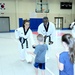 Black belt master champions student success