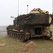 3-29 FA battery trains beside Romanian artillerymen