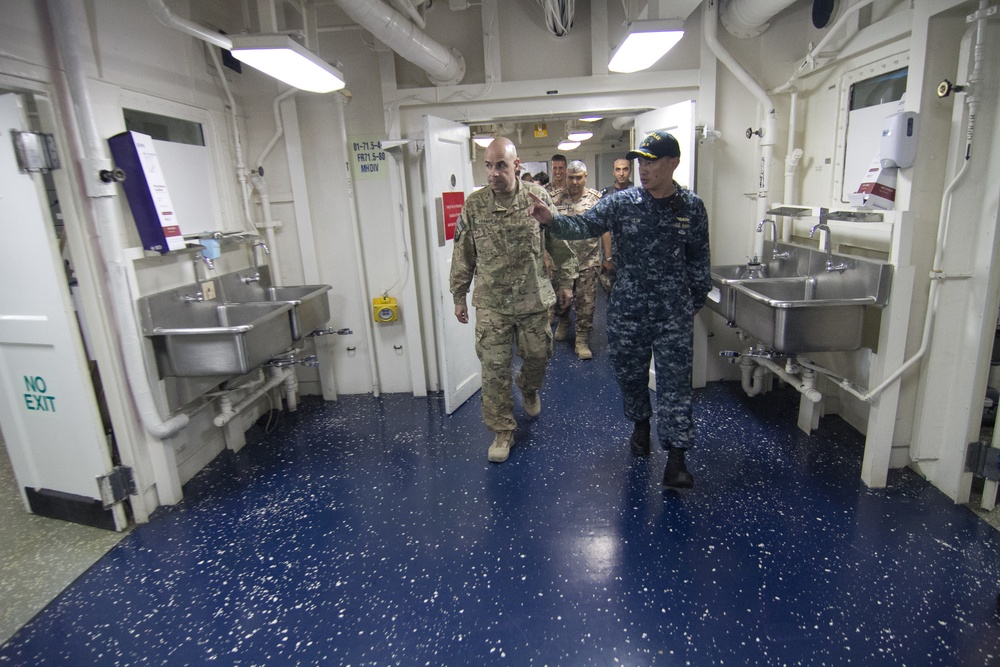 Brig. Gen. Jeffrey Kramer, commanding general, Combined Joint Operations Center/Army Forces-Jordan tours the USS Bataan medical facility during Eager Lion 17