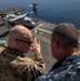 Cmrd. Sylvester Steele explains USS Bataan Air operations with Briga.Gen. Jeffrey Kramer, commanding general, Combined Joint Operations Center/Army Forces-Jordan during Eager Lion 17