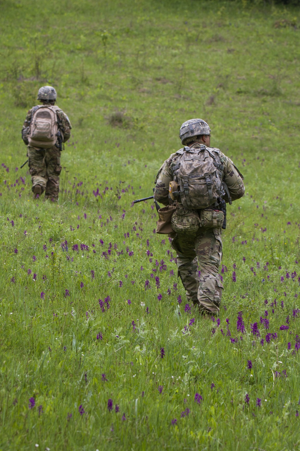 MNBG-East Soldiers Patrol Field During Training