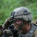 Soldier Pauses to Fix Eye Pro During Training