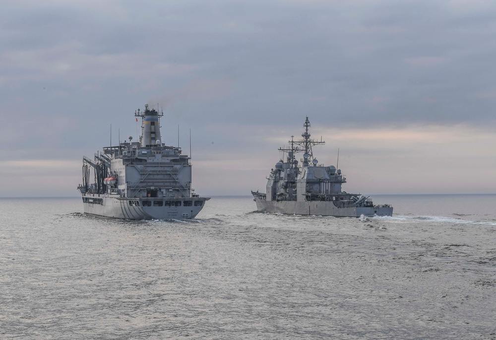 USS Lake Champlain Conducts a Replenishment-at-Sea