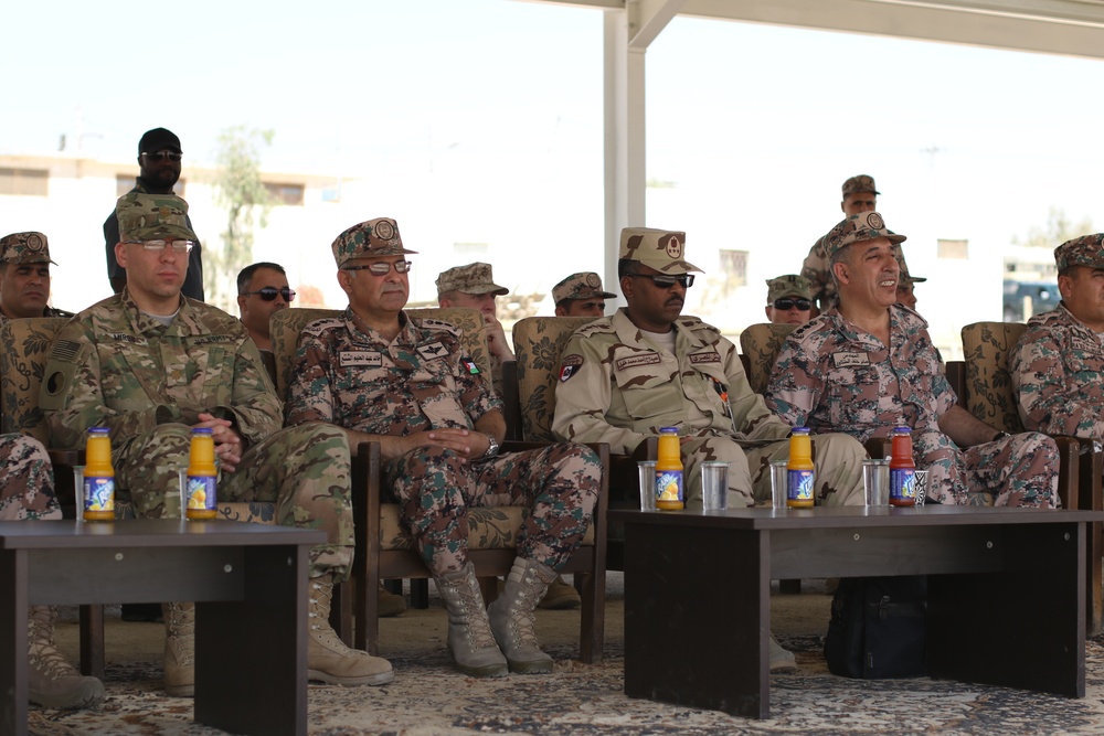 Jordanian and U.S. military distinguished visitors watch a chemical, biological, radiological, nuclear training exercise during Eager Lion 17