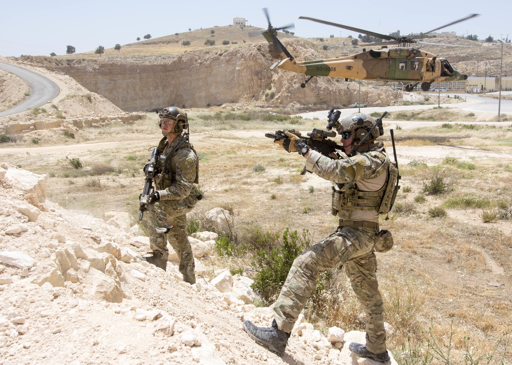 Members of the Air Force Special Operations, assigned to the 23rd Special Tactics Squadron, provide security of a landing zone during a combat search and rescue exercise in support of Eager Lion 2017.