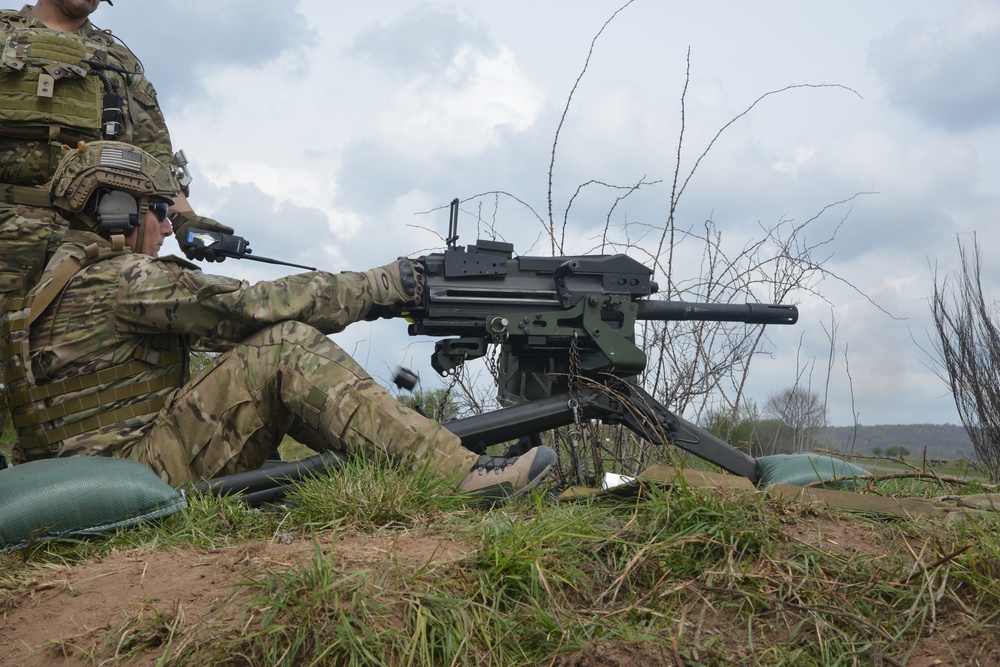 Soldier firing the MK-19 machine gun