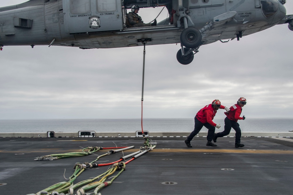 USS America conducts ammo transfer