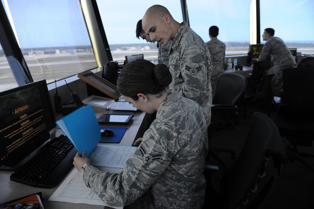 Air traffic controllers guide pilots to success