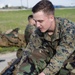 BSRF 17.1 Marines hike in mission oriented protective posture suits