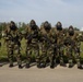 BSRF 17.1 Marines hike in mission oriented protective posture suits