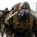 BSRF 17.1 Marines hike in mission oriented protective posture suits