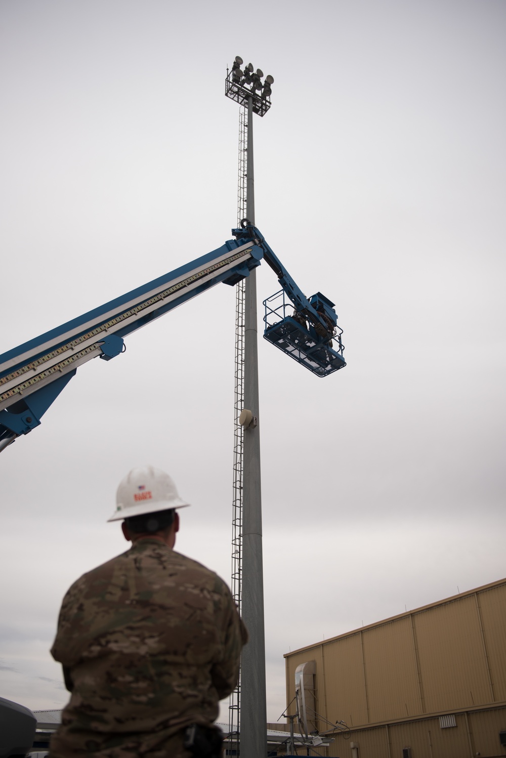 Don’t look down: Engineers go to great heights to fix infrastructure, airfield