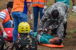 AFP, U.S. Soldiers provide aid during simulated mass casualty training